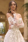 Off-The-Shoulder Neckline with Sheer Illusion Sleeves and A Corseted Bodice.-2